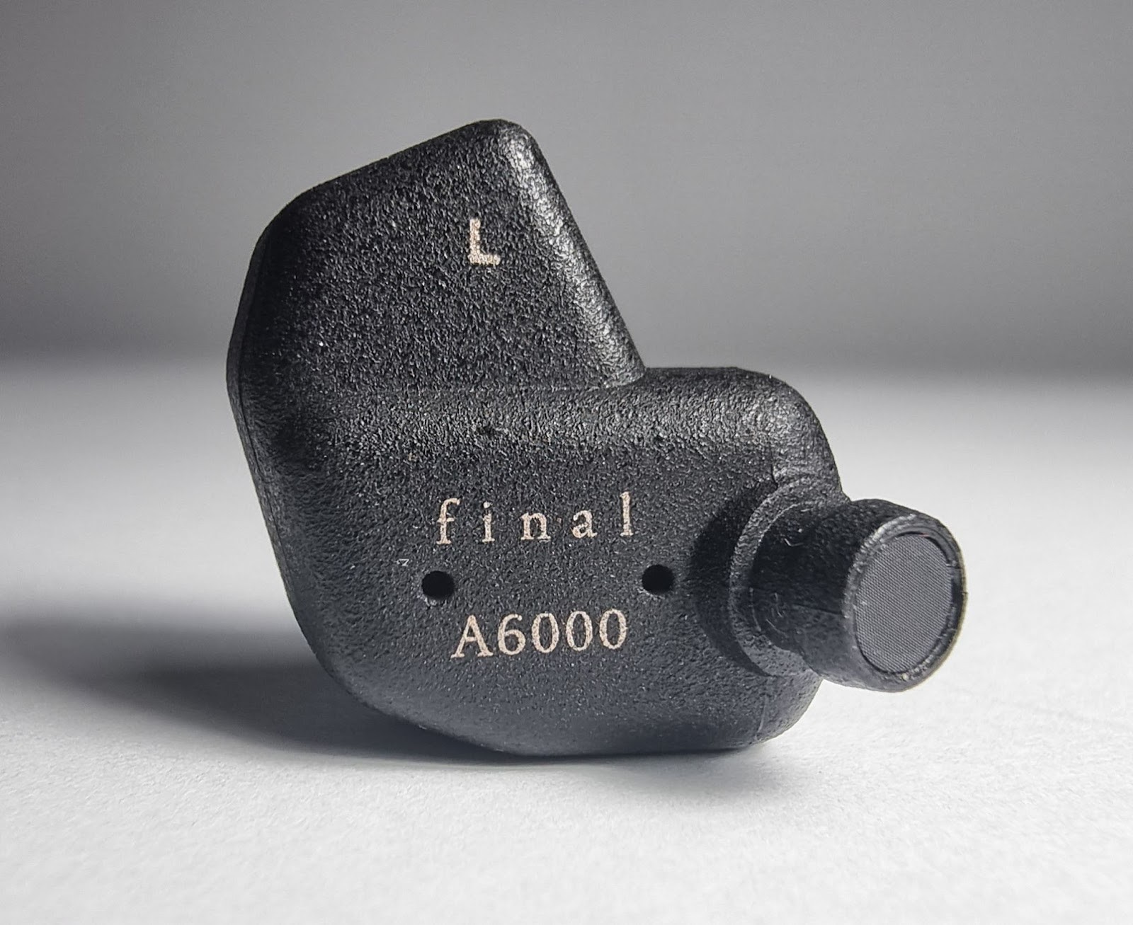 Final Audio A6000 Review: Japanese precision with a taste for detail 10 They are made of ABS plastic covered with metal spraying, which gives the surface an unusual texture with small irregularities and roughness.