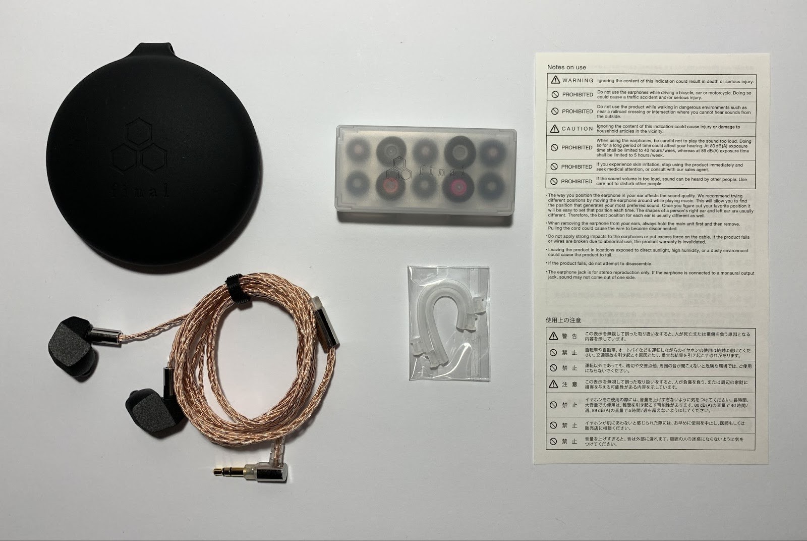 Final Audio A6000 Review: Japanese precision with a taste for detail 9 Opening the box, on top in a foam bed is a silicone case, additionally packed in a cellophane bag. Inside are the headphones, already connected to the cable, but without ear pads.Each earphone and cable plug are wrapped in small cellophane bags and secured with tape.