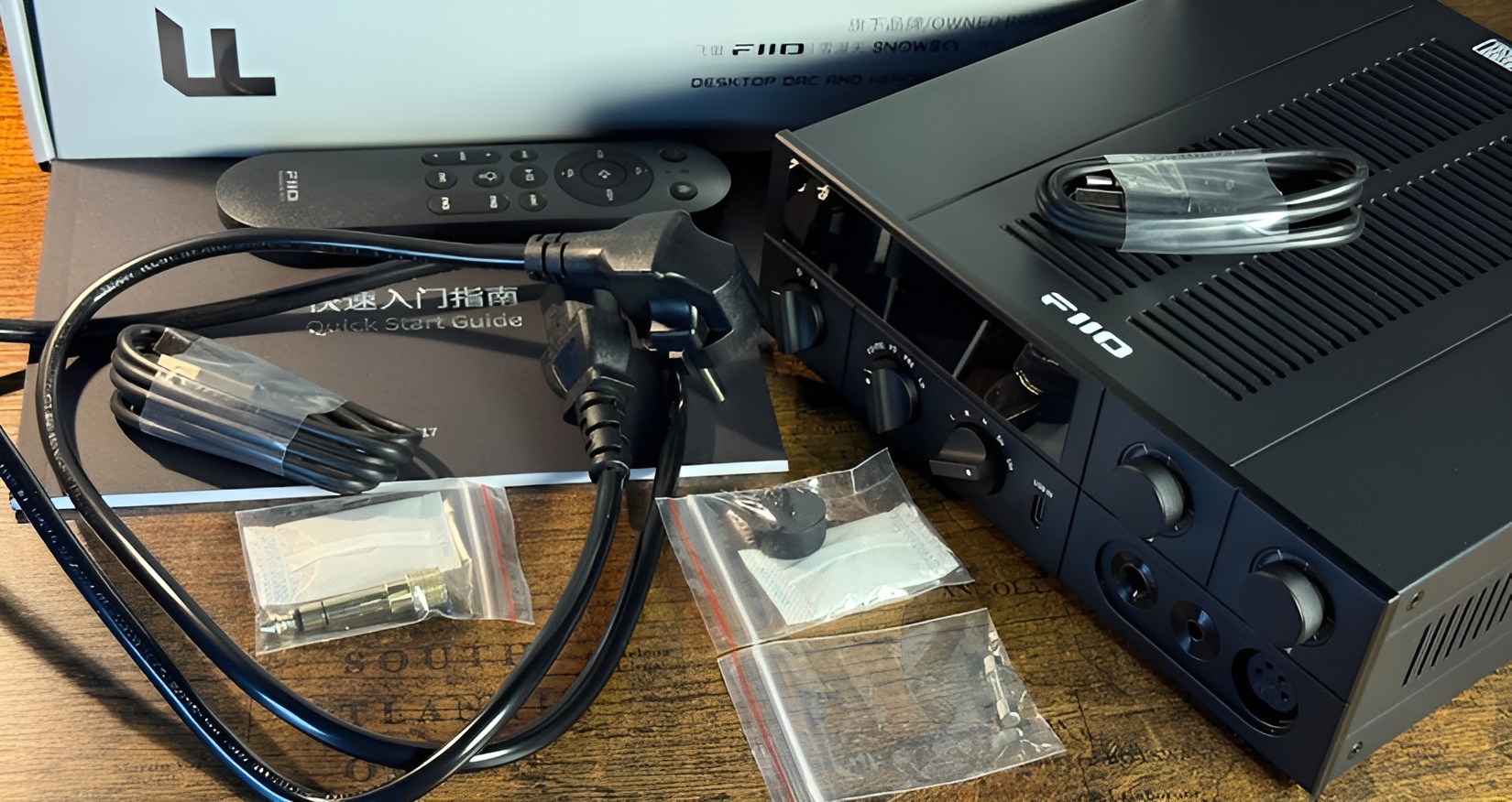 FiiO K17 Review: High-End Desktop DAC/Amp with Serious Flexibility 8 The FiiO K17 combines retro-inspired design with a modern touchscreen interface, creating a unique visual and tactile experience.