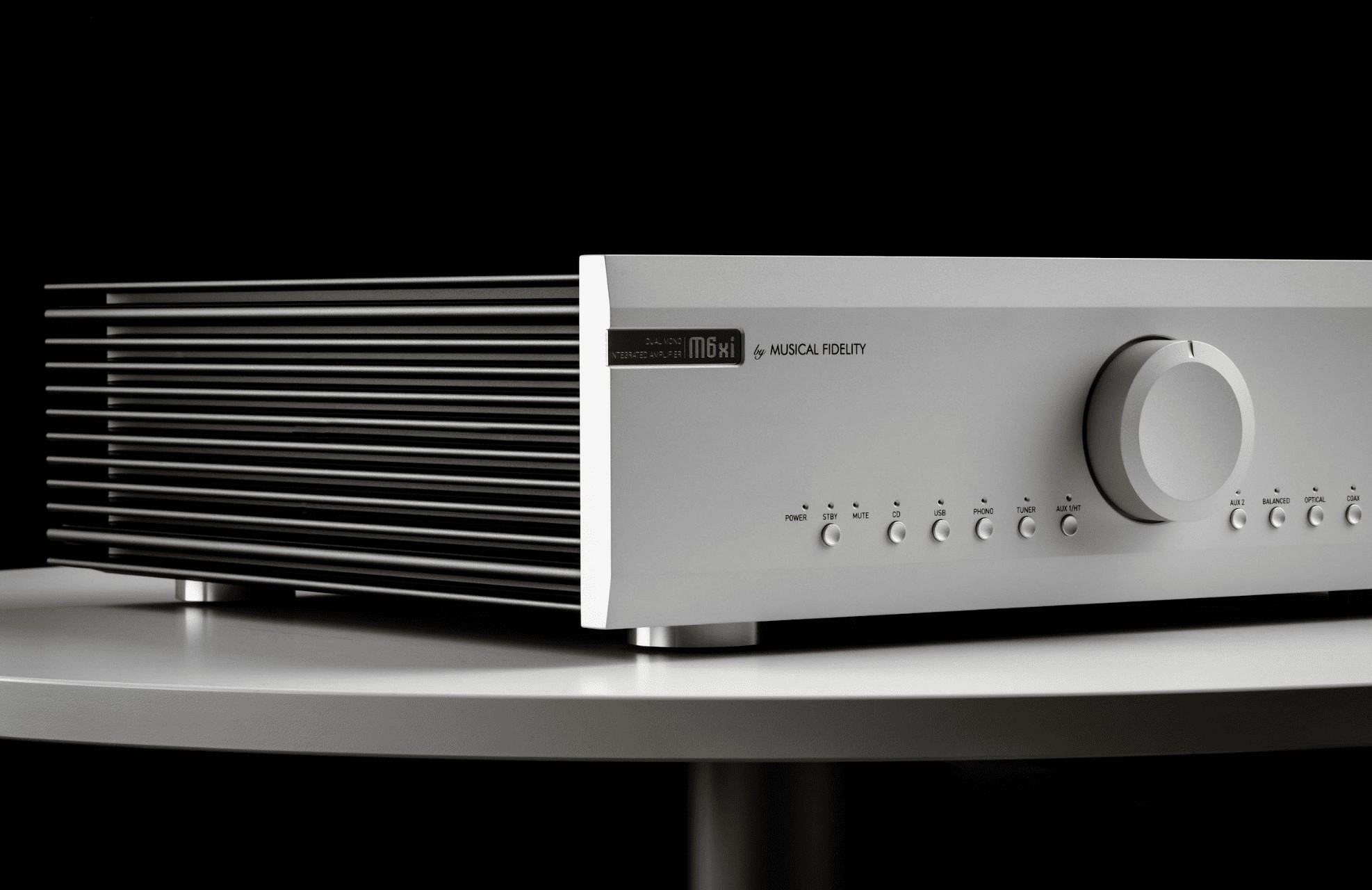 Musical Fidelity M6xi: Integrated Amplifier with Serious Power and System Flexibility 8 The preamplifier features a pre-out for bi-amping or subwoofer integration and a turntable input that supports both MM and MC cartridges.